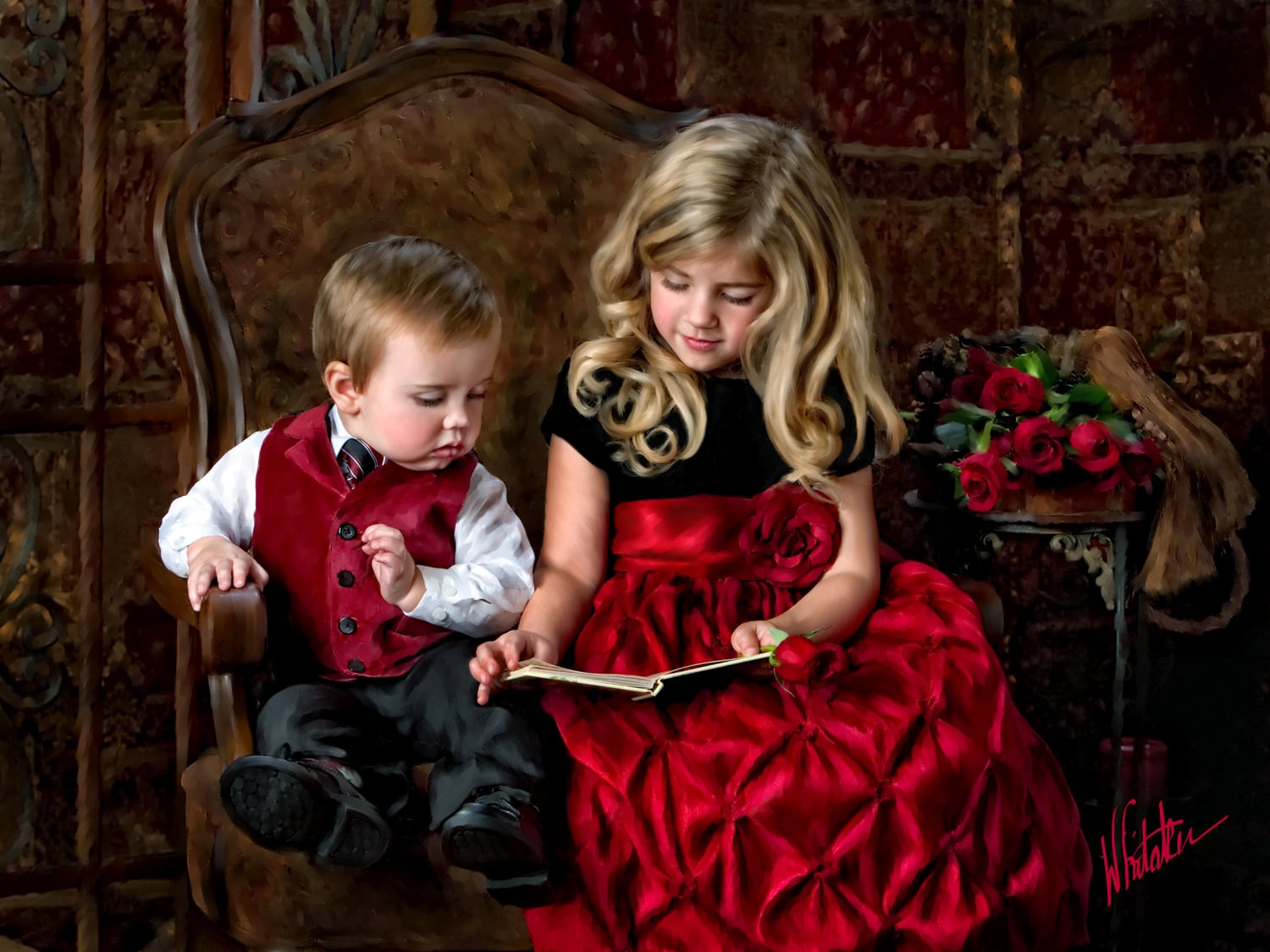 Brother and Sister reading a book for their portrait